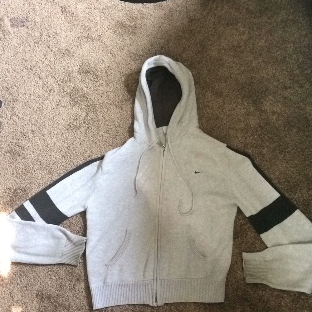 gray and black Nike zip up sweatshirt